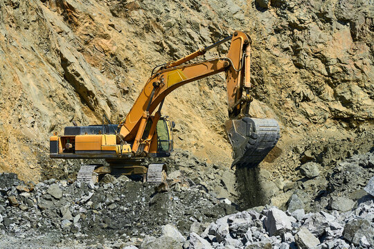 Excavator in copper mining open-pit operation