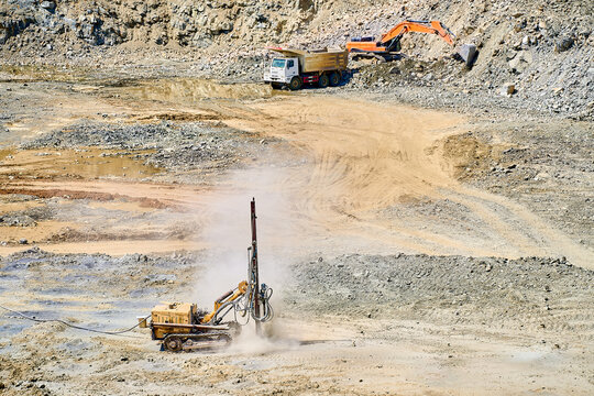 Open-pit copper mining with heavy machinery