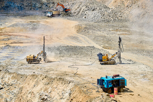 Open-pit copper mine with heavy machinery in operation