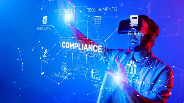 A young man wearing a virtual reality headset explores digital compliance concepts and regulations, showcasing innovation and technology in a modern environment. Raster