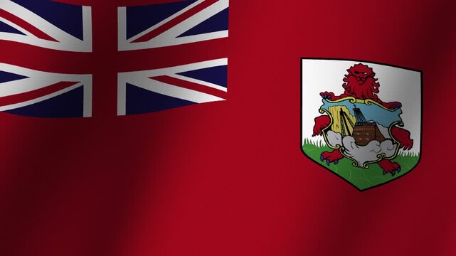 Bermuda Flag Waving Proudly: The vibrant red ensign of Bermuda, featuring the Union Jack and its distinctive coat of arms, ripples dynamically in the wind, symbolizing national pride and heritage.