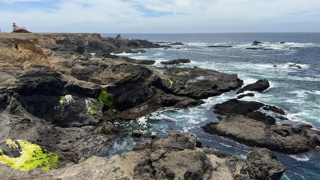The coastal trail towards Cabrillo Lighthouse in Mendocino California by the ocean.