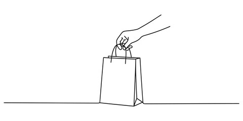 Fototapeta premium Continuous single line drawing of a hand holding a paper shopping bag