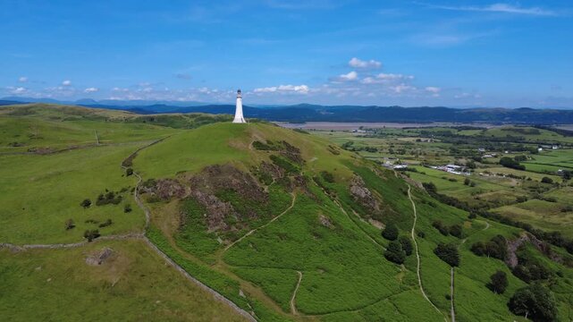 Scenic aerial view of Hoad Hill in Ulverston with the monument showing the river Leven and the southern lake district in the distance