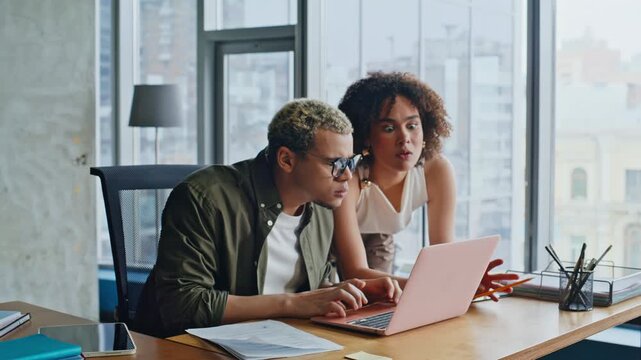 Stressed coworkers reacting bad news laptop. Frustrated business team problem