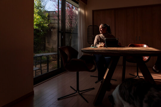 Woman working from home in a cozy setting