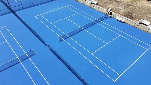 4K top-down aerial view on a tennis court 