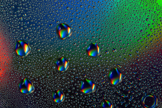 Vibrant neon drops creating a mesmerizing pattern