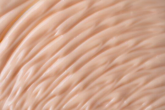 Creamy body lotion texture background for skincare design