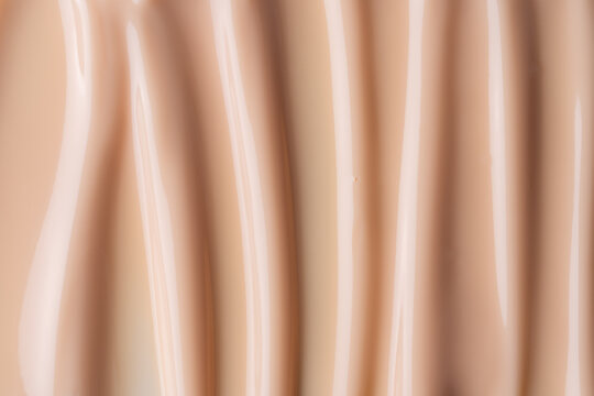 Smooth body cream texture background for skincare cosmetics