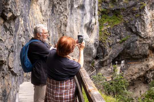 Seniors exploring a stunning gorge landscape