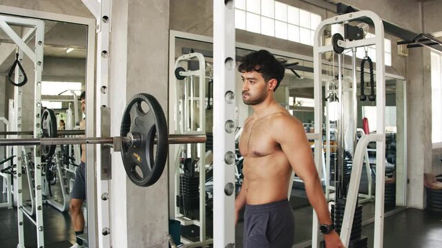 Athlete Performing Upright Row with Barbell