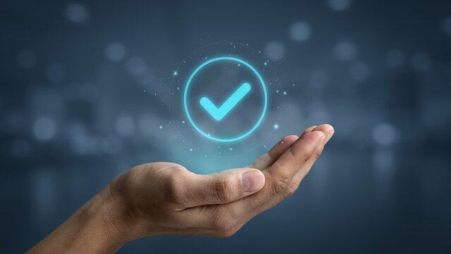 Bright blue glowing check mark icon floating above an open human hand in dark space