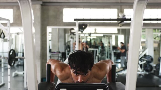 Athlete Performing Dip Exercise on Parallel Bars