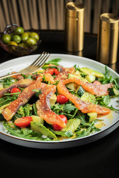Salad with salted salmon and arugula