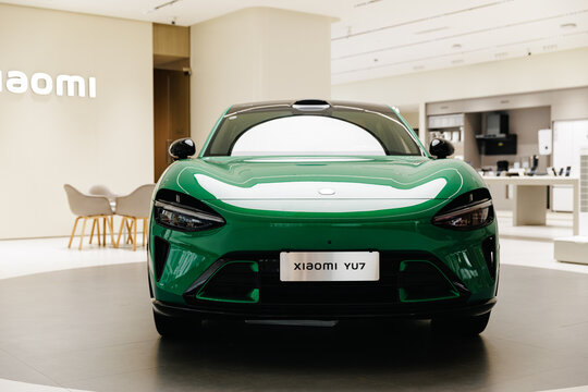 Guangzhou, China - December 22, 2025: green electric crossover xiaomi car YU7 vehicle in showroom