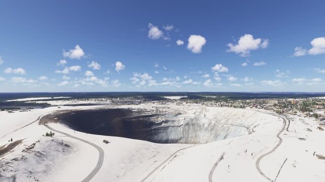 Aerial view of the snow at Kimberlitovaya Trubka Mir diamond mine in Mirny. Sakha Republic. Russia