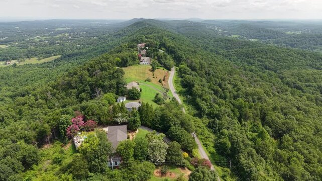Aerial View of Rural Homes Nestled in Forested Hills Near Ringgold, Georgia