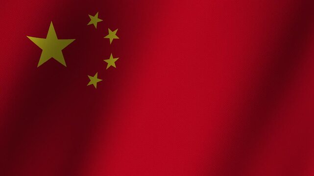 Chinese Flag Waving: A vibrant red Chinese national flag with yellow stars ripples gently in the wind, symbolizing patriotism and national pride.