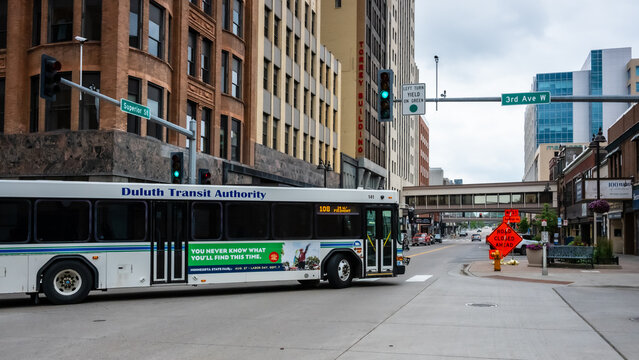 Duluth, MN, USA - Jul 25, 2026: A Duluth Transit Authority city bus traveling downtown in summer.
