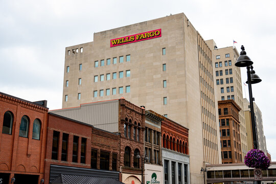 Duluth, MN, USA - Jul 25, 2026: Wells Fargo bank building in downtown area with classic brick facades and city street light