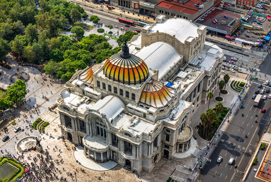 Aerial view of the Palacio de Bellas Artes, Mexico City iconic Palace of Fine Arts, surrounded by the historic center on a sunny day.