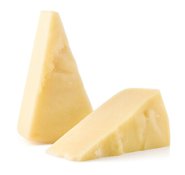 Parmesan cheese pieces on white background
