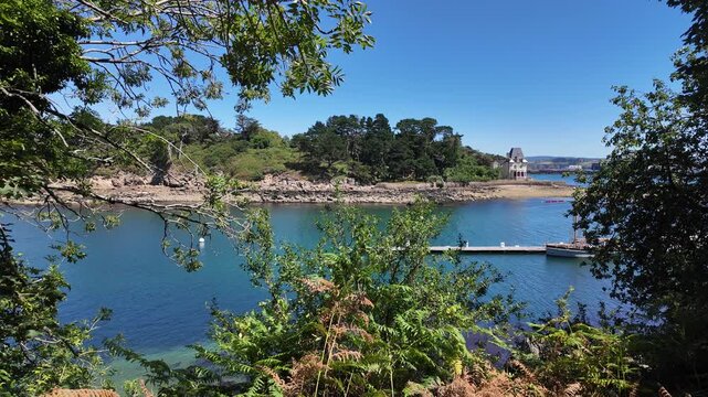 Harbor View Through Trees in Douarnenez, Brittany, France
