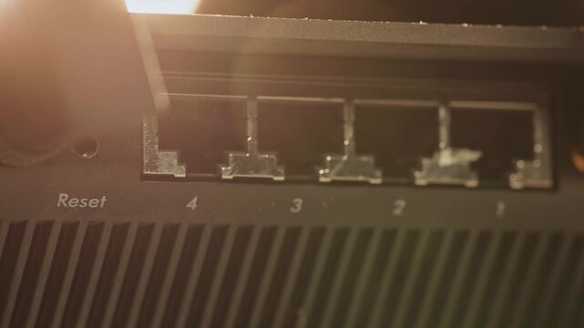 Slow motion detailed view of wireless internet router machine for antenna modem connection to online virtual world, with device having antennas, ethernet ports, usb, and computer 5g wifi connections