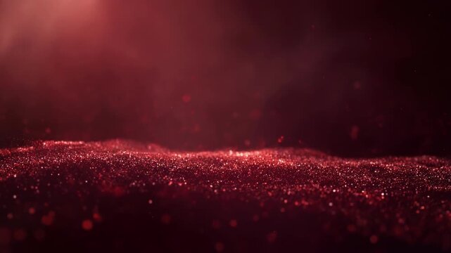 Close-up of sparkling red glitter particles scattered on a surface