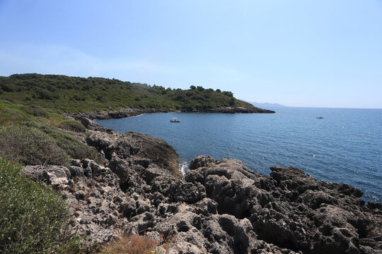 Scenic view of the rocky coast and Mediterranean vegetation along the Porto Cofaniello trail in Gianola Park (Riviera di Ulisse), Italy