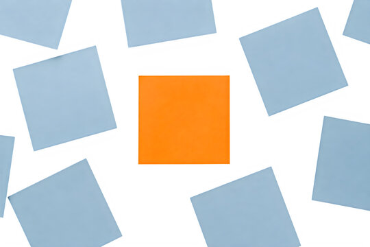 Orange sticky note among blue paper squares, unique standout concept for leadership and individuality, colorful office stationery for business planning isolated on White Background ai