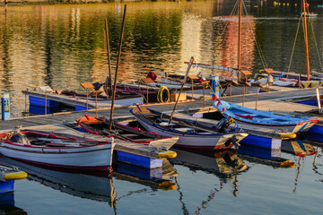 Traditional wooden fishing boats moored at a pontoon   © Noa
