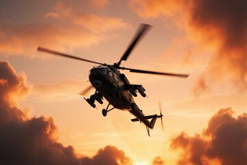 Fototapeta premium Military combat helicopter flies in orange sunset sky. Army aircraft patrols above clouds during evening mission. Armed gunship rotor blades spin fast vehicle moves across horizon. Professional