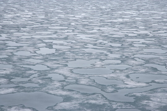 Sea ice and reflections in the Arctic near Svalbard