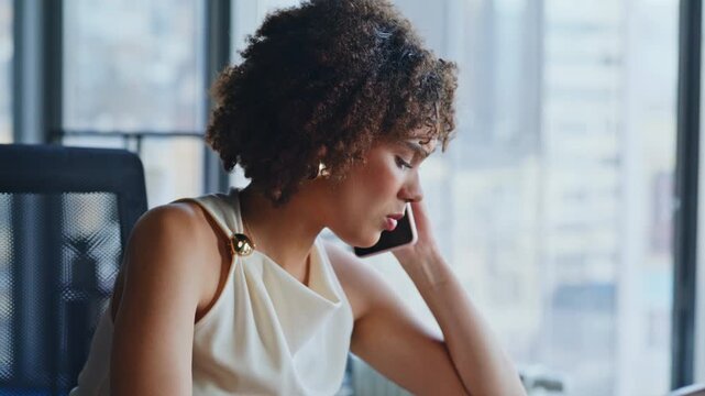 Businesswoman phone call reviewing documents office. Close up worried report