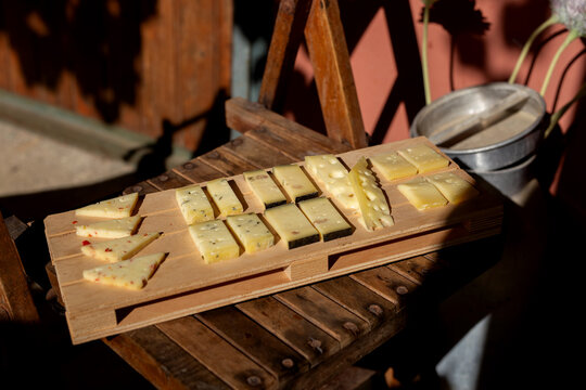 Mixed Italian cheese board with grana pecorino gorgonzola and aged cheeses tasting
