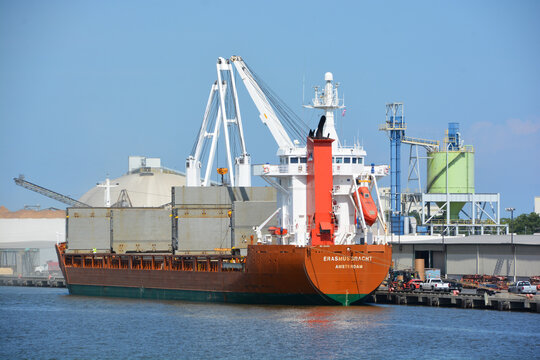 SAVANNAH GEORGIA USA:  Port of Savannah is a major U. S. seaport. Its facilities for oceangoing vessels line both sides of the Savannah River 18 miles (29 km) from the Atlantic Ocean