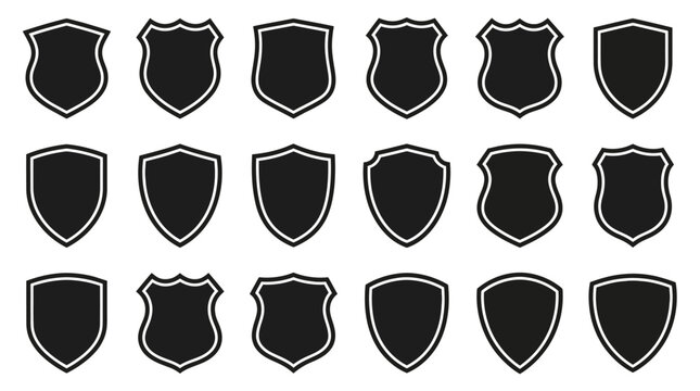 Shields presented in a grid of multiple unique silhouettes provide a comprehensive library of classic heraldic shapes for security, law enforcement, or institutional branding purposes.