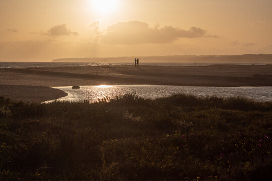 Sunset view at Lagoa Natural dos Salgados in Albufeira, Portugal