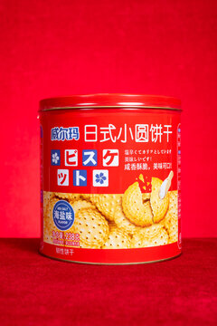 ZHONGSHAN China-February 12 2026: Weierma sea salt Japanese round biscuits in red metal tin can.