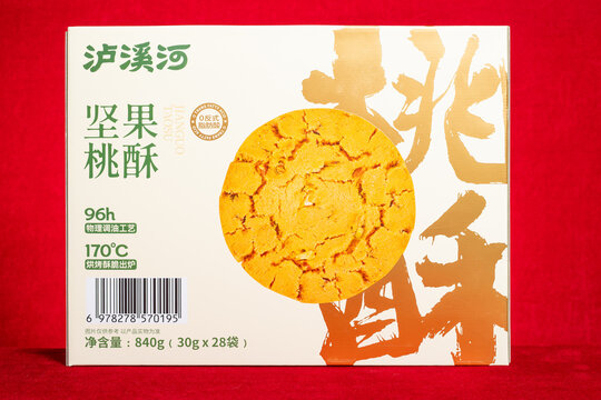 ZHONGSHAN China-February 12 2026: A clean beige paper box packaging of Lu Xi River nut peach crisp, printed with baked cookie image.