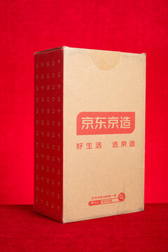 ZHONGSHAN China-February 9 2026: A vertical studio shot of a light brown kraft cardboard carton for JD Jingzao.