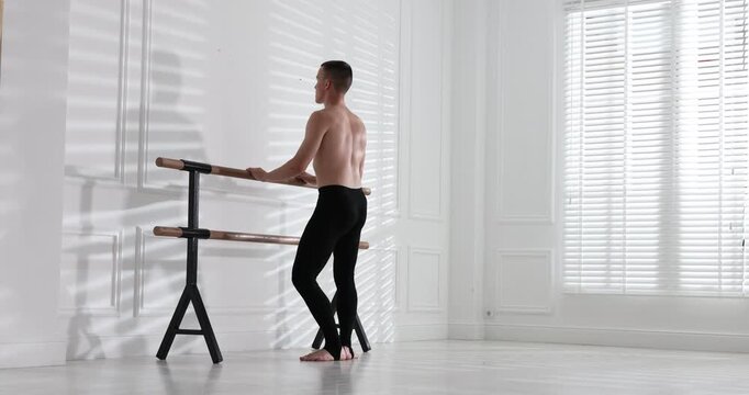 Professional dancer practicing moves in dance studio