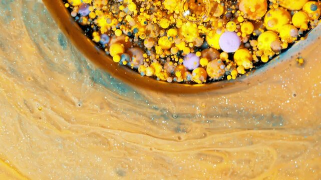 4K Gold Liquid Glitter Abstract Background. Flowing Fluid with Shimmering Particles, Macro Texture Video, 2160p