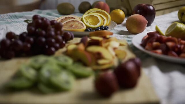 Counter filled with various, delicious fruit - rack focused