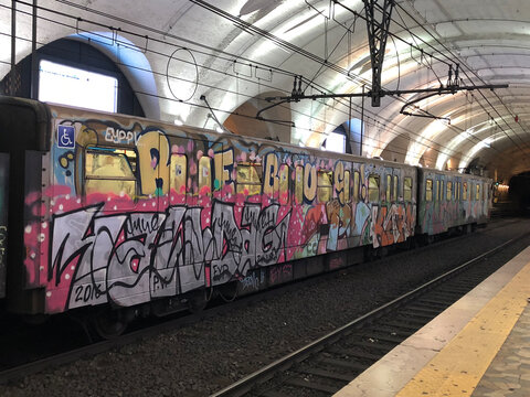 Graffitied Train in a tunnel