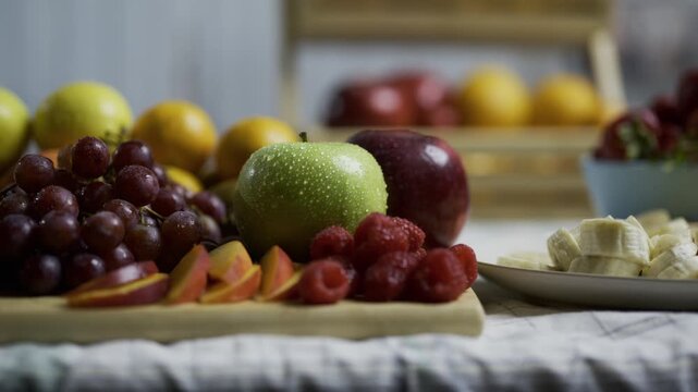 Cinematic tracking shot across kitchen counter with various, delicious fruit
