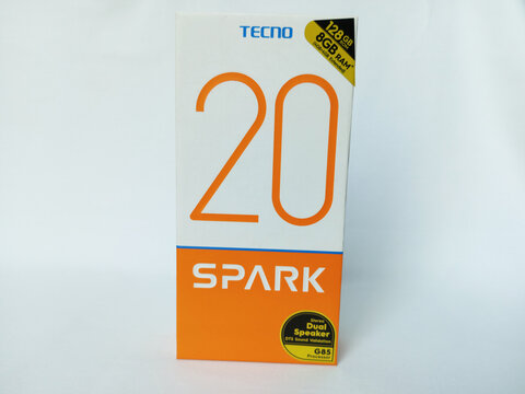Tecno smartphone paper box package on white background. Spark 20 phone box designed by Tecno. An android phone with fingerprint and proximity sensor and dual flash. Kumasi, Ghana - February 4, 2025
