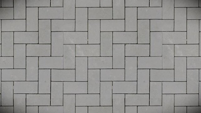 Modern grey paving blocks create a geometric seamless loop texture.